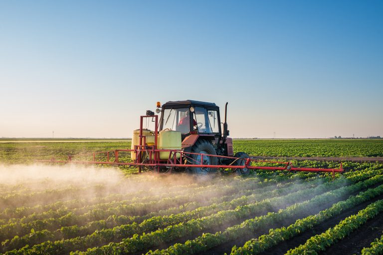 Tractor spraying